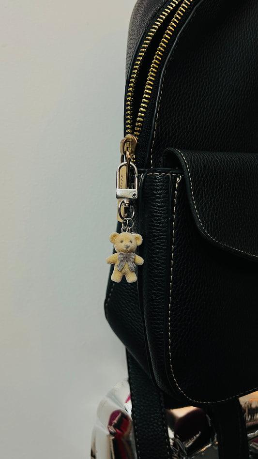 Furry brown teddy bear bag charm with a bow and a heart charm (view 2)