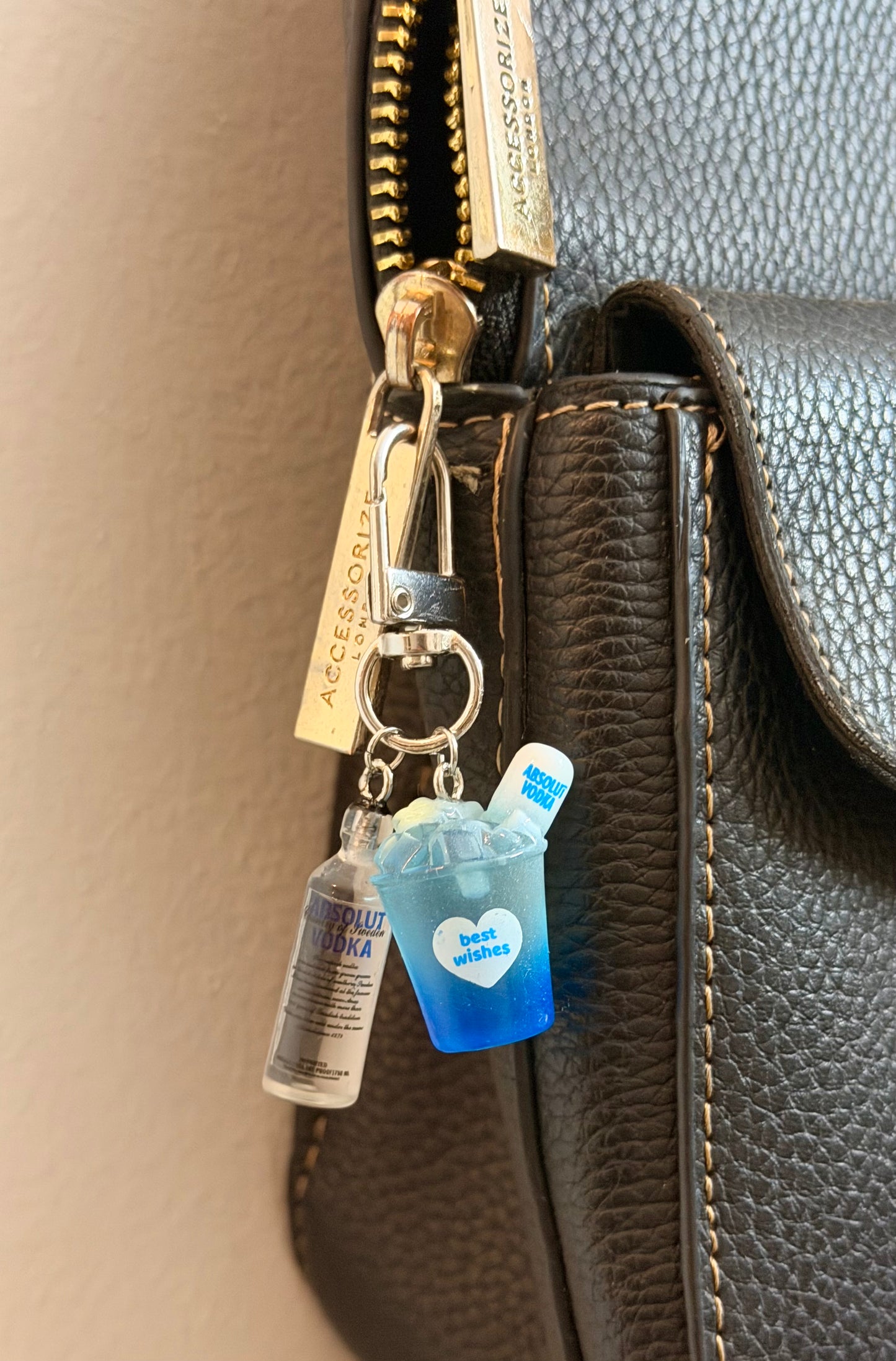 Absolut Bottle Bag Charm, miniature clear vodka bottle charm clipped to a bag