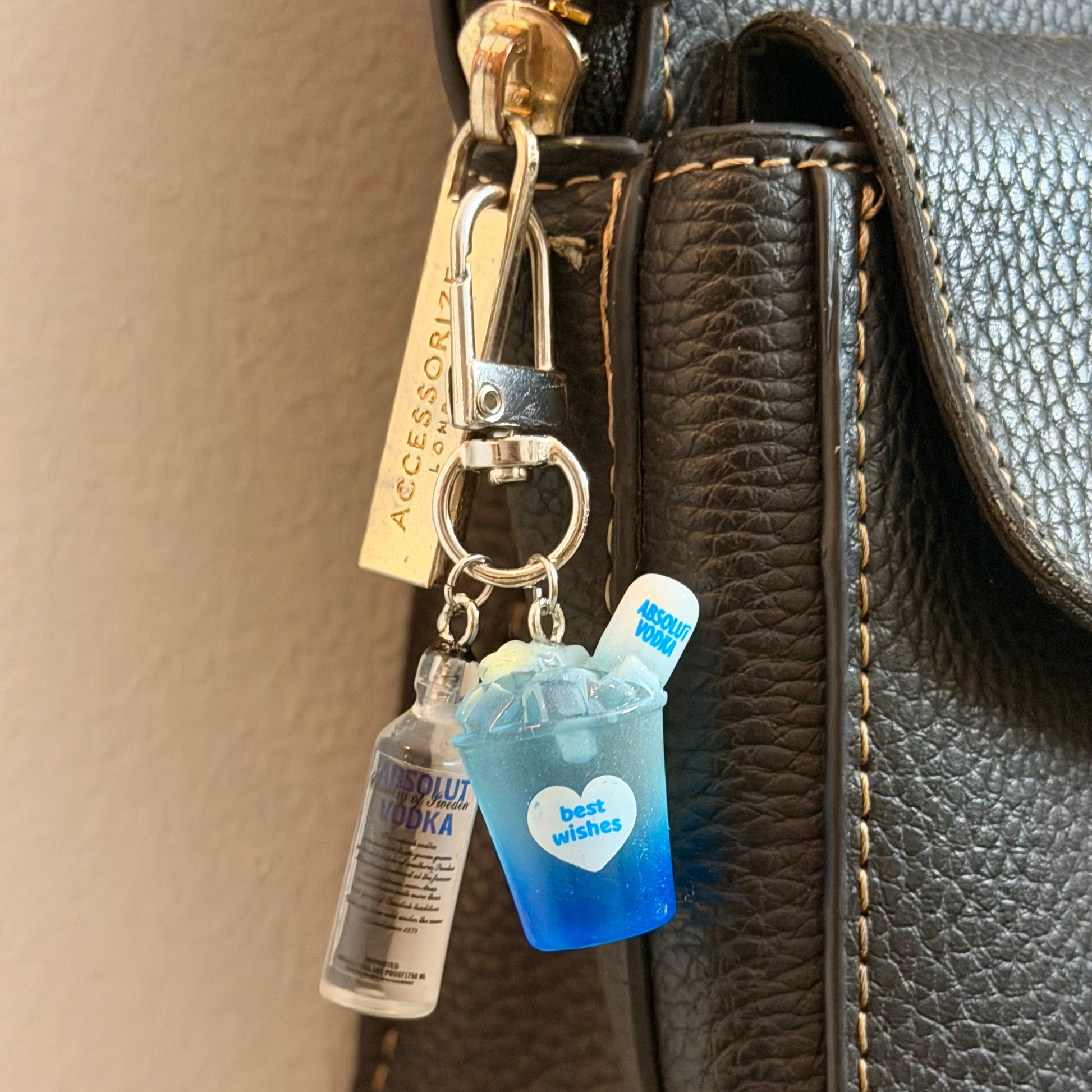 Absolut Bottle Bag Charm, miniature clear vodka bottle charm clipped to a bag