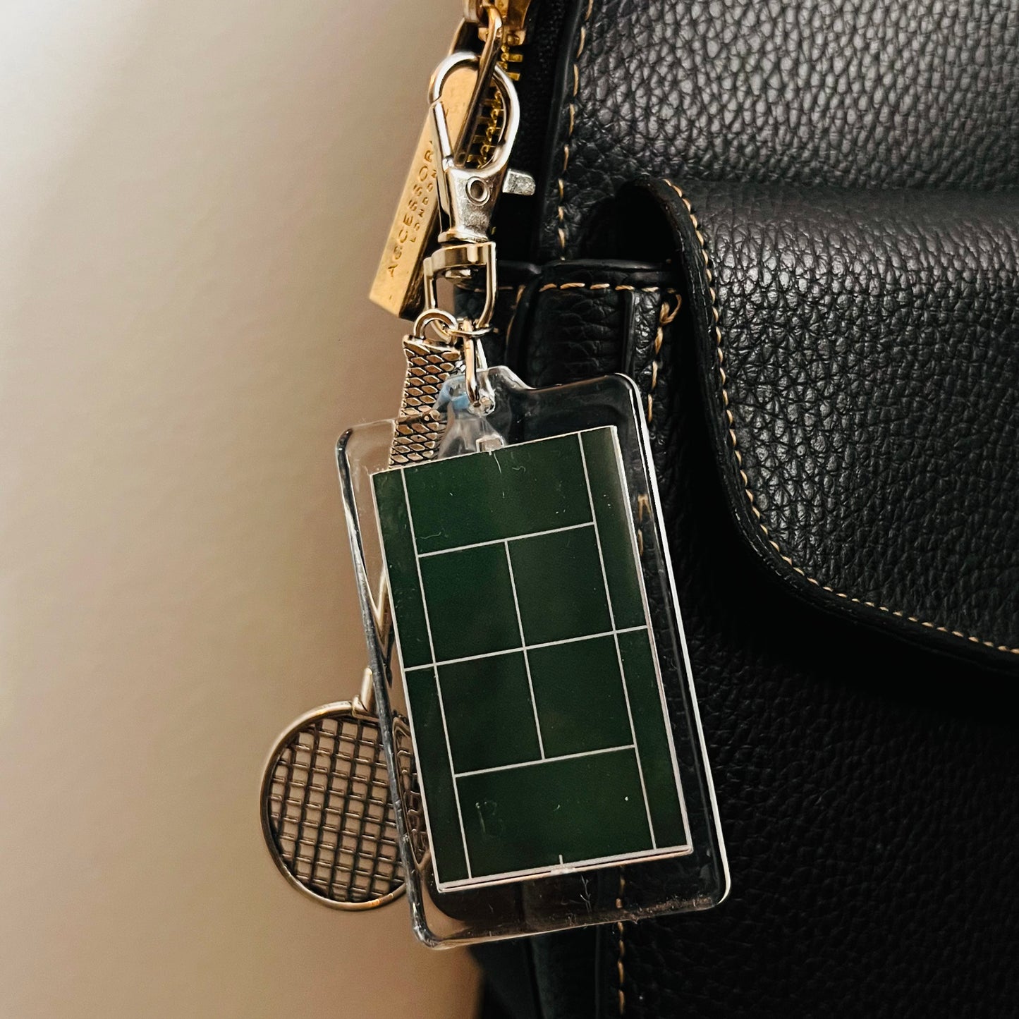 Badminton Racket & Shuttlecock Bag Charm, silver badminton racket and shuttlecock charm with an acrylic court panel