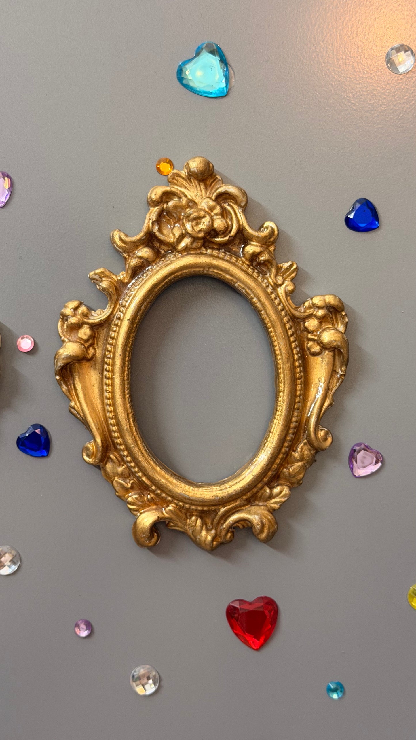 Antique Royal Magnetic Frame, empty gold concrete baroque frame showing the scrollwork and rose crest