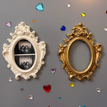 Antique Royal Magnetic Frame, close view of the white and gold concrete baroque frames on a fridge door