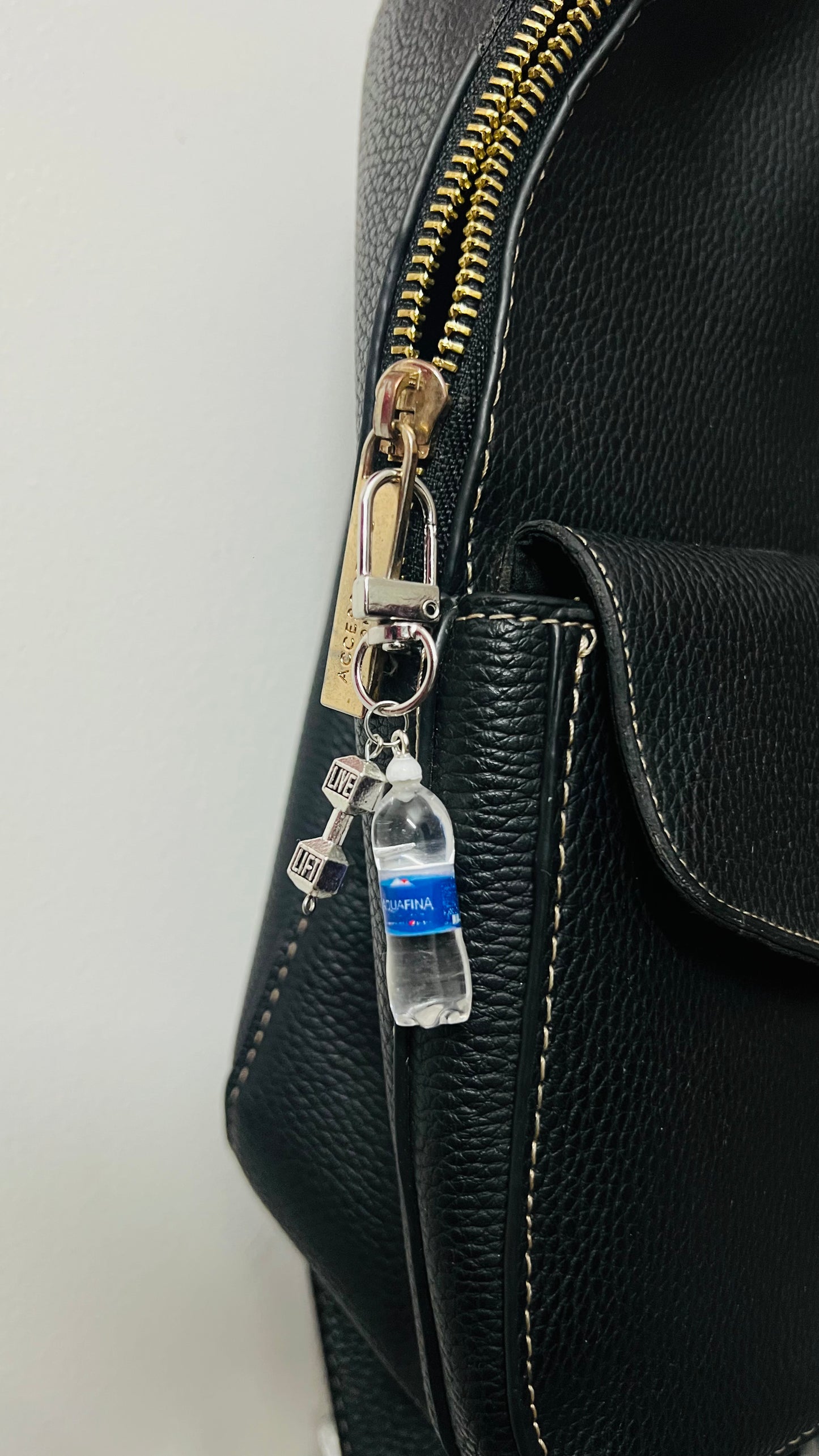 Aquafina water bottle bag charm with a silver dumbbell charm (view 2)