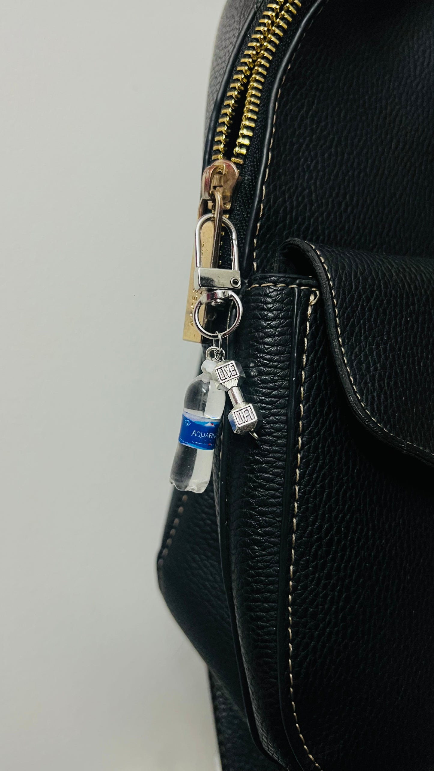 Aquafina water bottle bag charm with a silver dumbbell charm (view 3)