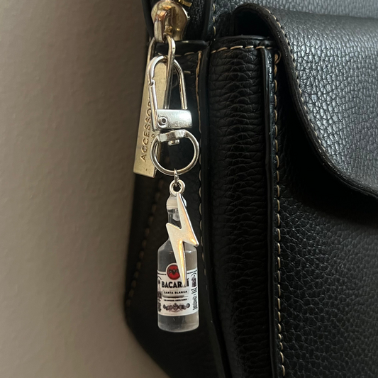 Bacardi Bottle & Lightning Bolt Bag Charm, mini rum bottle charm with a silver lightning bolt