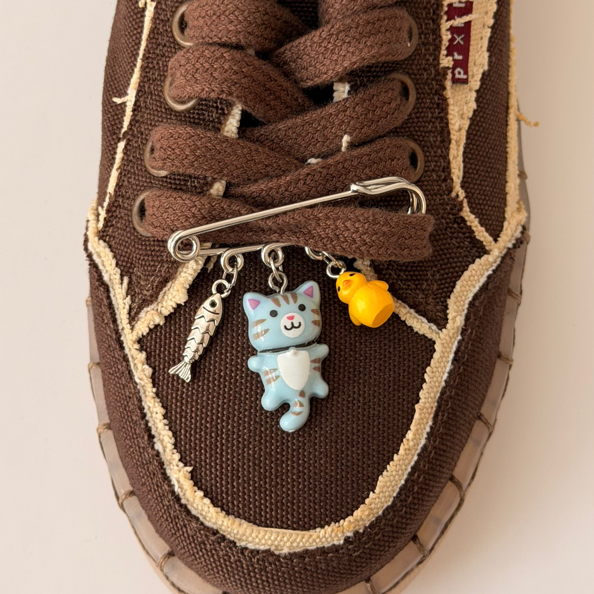 Blue Cat Charm, silver brooch pin with fish, blue tabby kitten and yellow chick charms