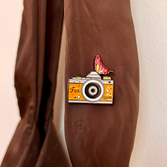 Caught in a Moment Enamel Pin, orange retro film camera reading For you with a butterfly on top