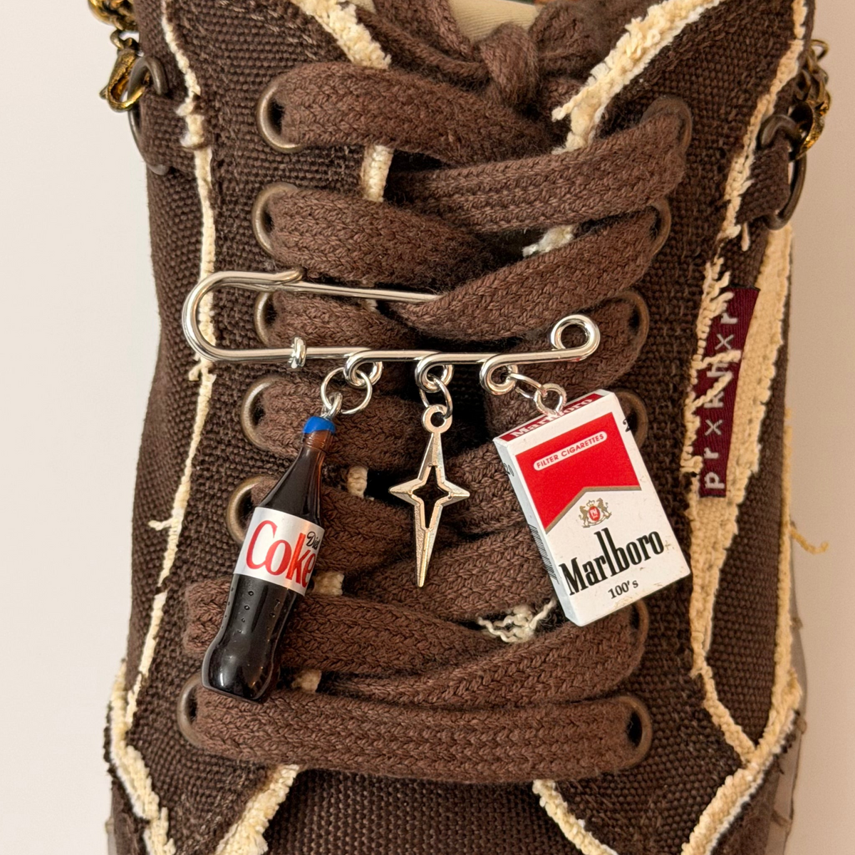 Coke & Smoke, silver brooch pin with Diet Coke bottle, star and Marlboro pack charms