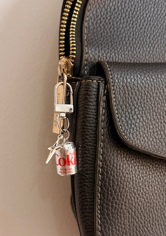 Metallic Diet Coke Star Bling D-Hook Bag Charm, silver Diet Coke can with a silver star charm on a D-hook clasp