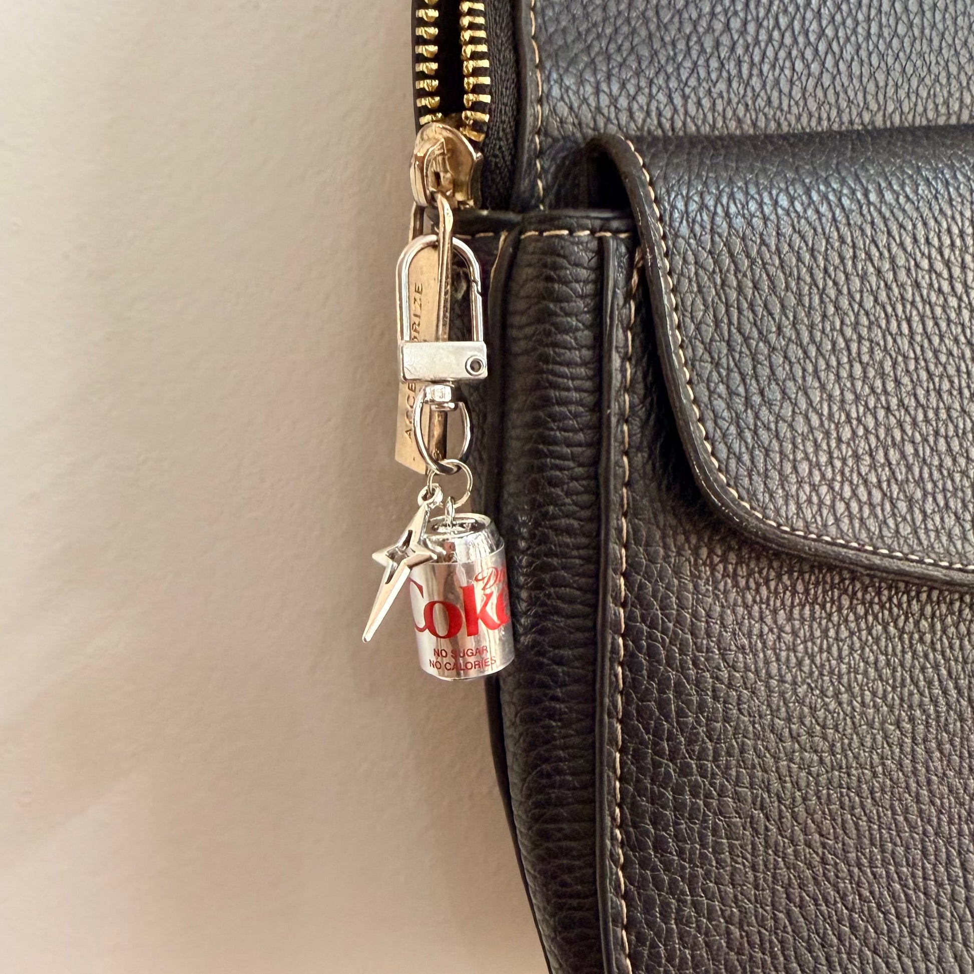Metallic Diet Coke Star Bling D-Hook Bag Charm, silver Diet Coke can with a silver star charm on a D-hook clasp