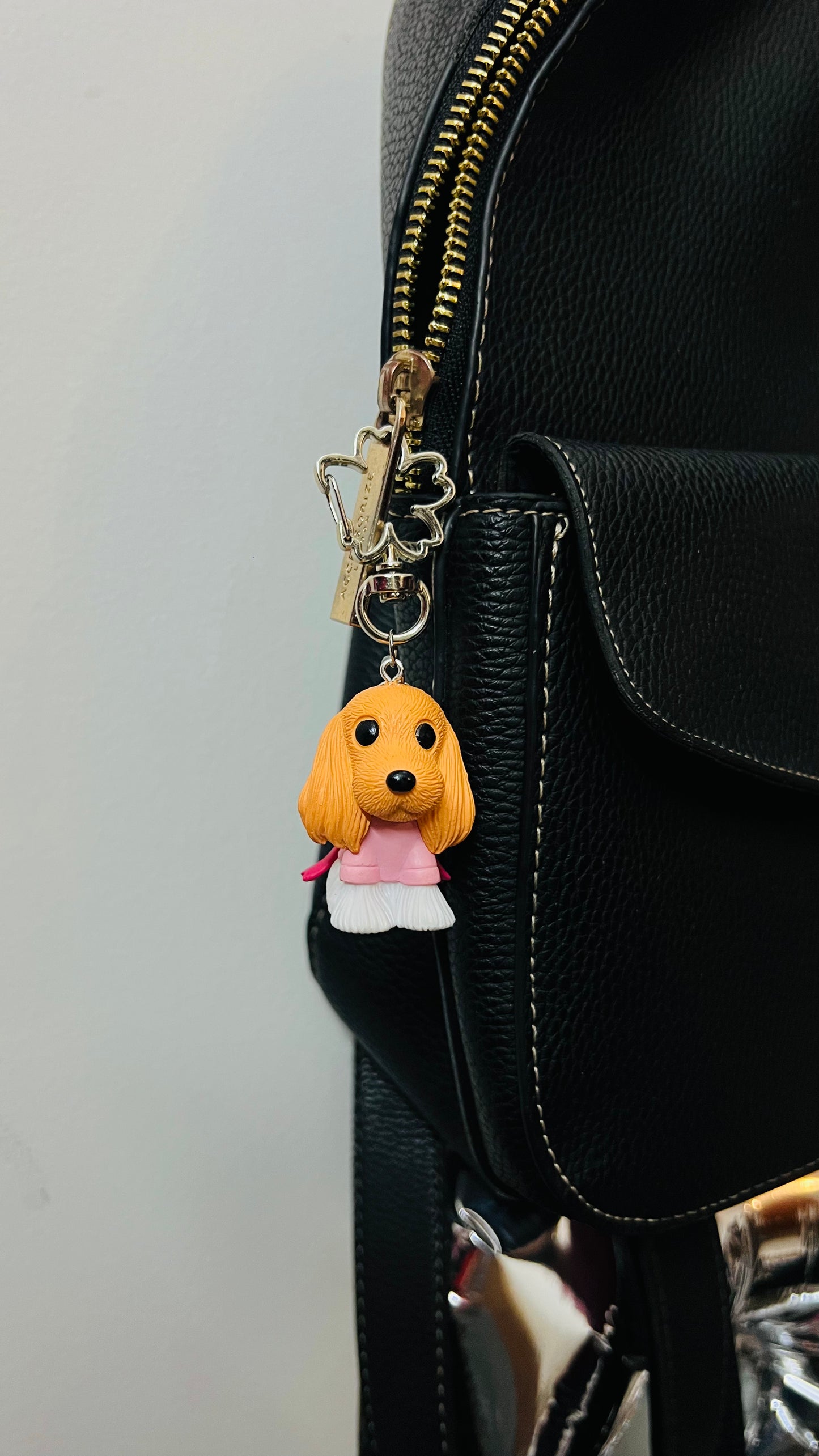 Golden puppy bag charm dressed in a pink outfit (view 4)