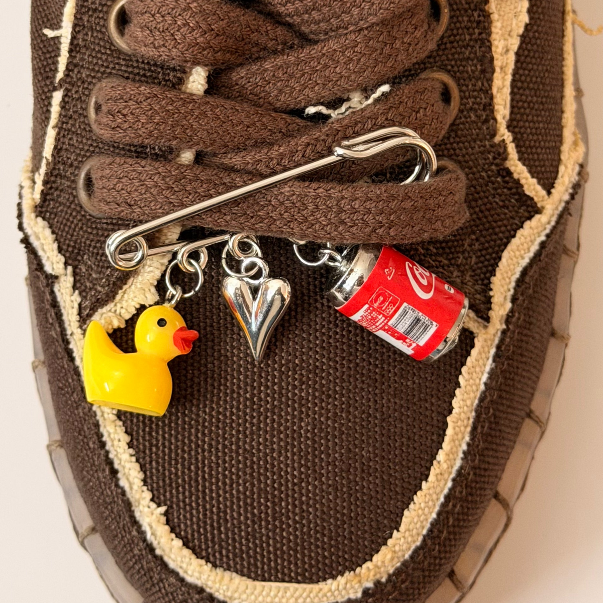 Ducky on Duty, silver brooch pin with rubber duck, silver heart and Coca-Cola can charms