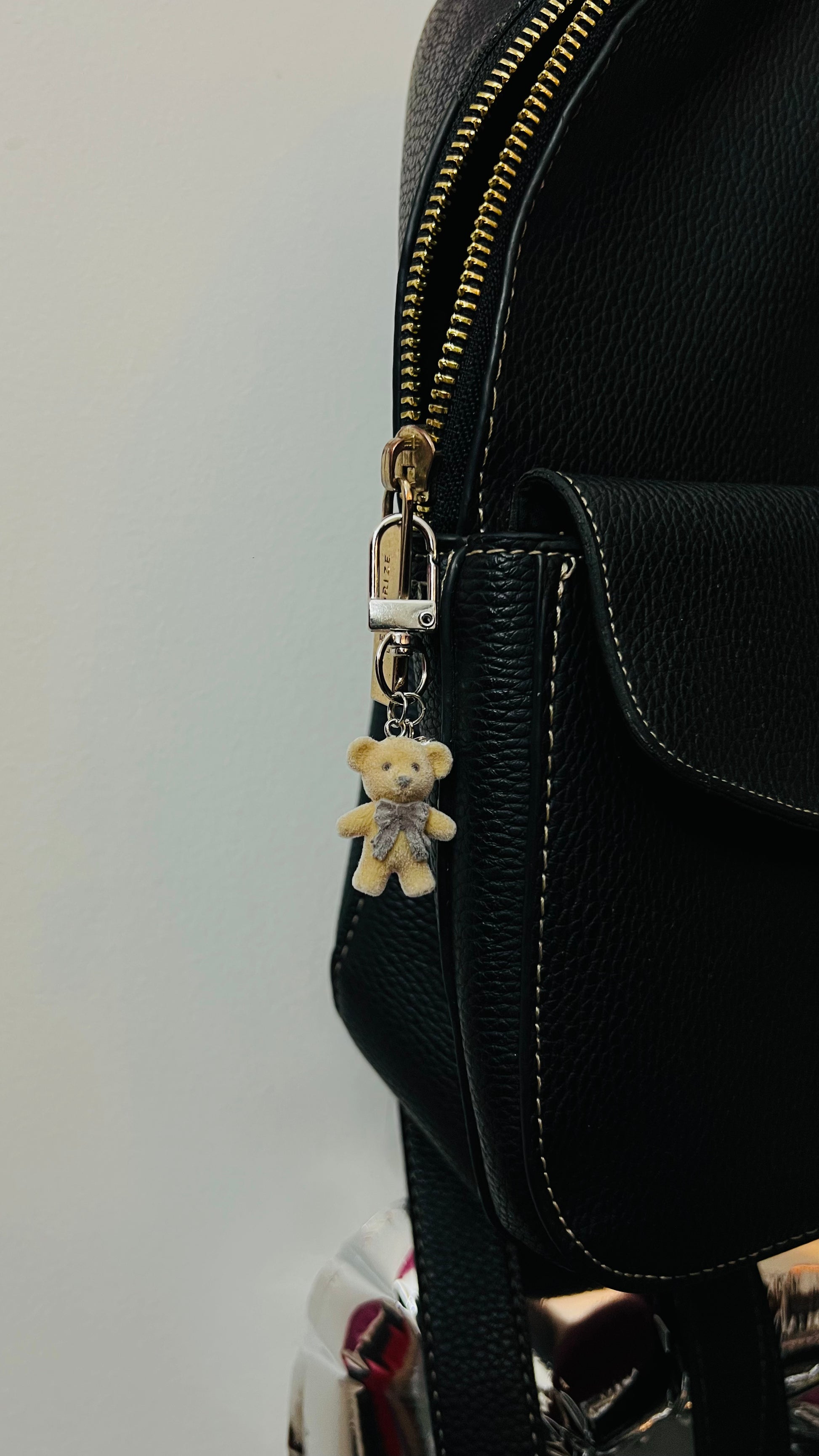Furry brown teddy bear bag charm with a bow and a heart charm (view 2)
