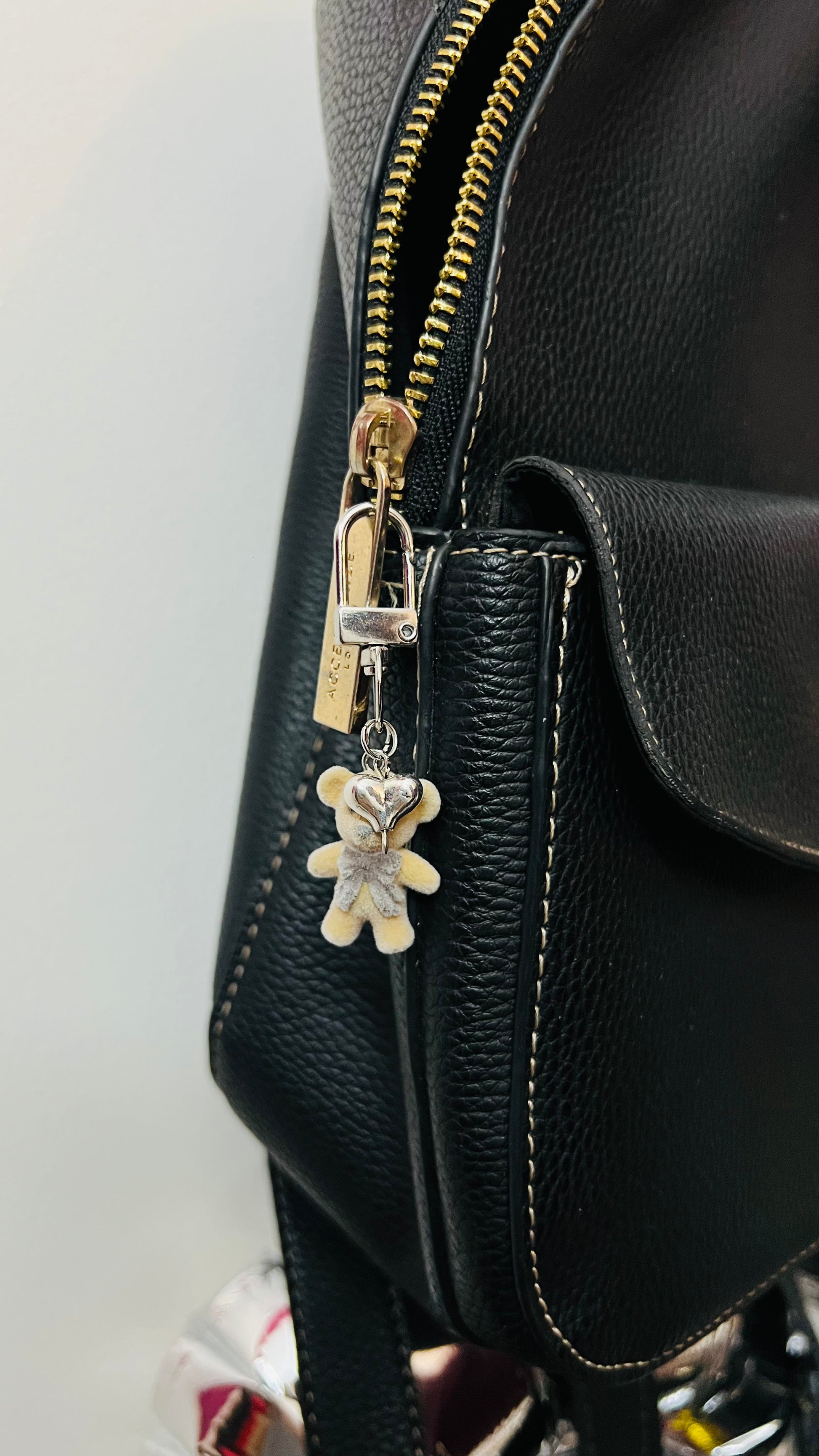 Furry brown teddy bear bag charm with a bow and a heart charm (view 3)