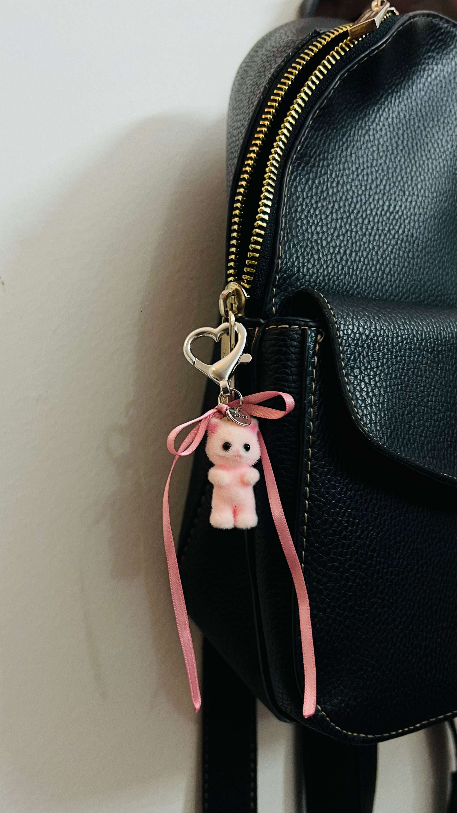 Furry pink cat bag charm with pink ribbon bows (view 2)