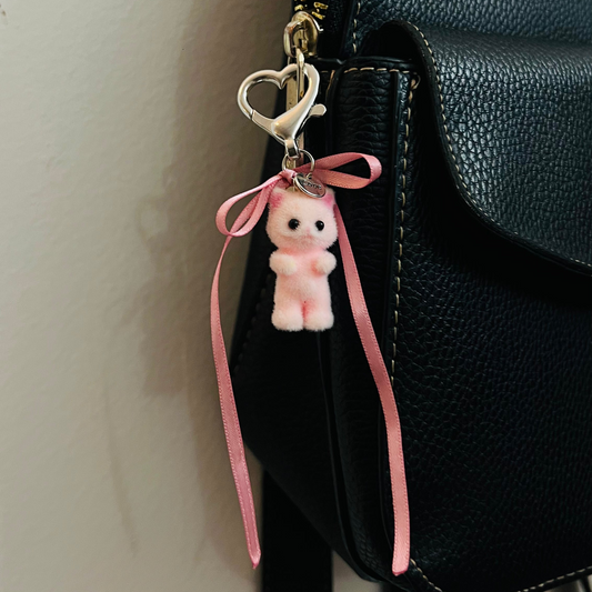 Furry pink cat bag charm with pink ribbon bows
