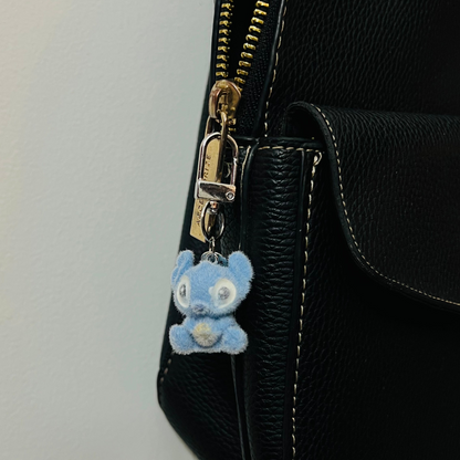 Furry pastel-blue Snitch bag charm