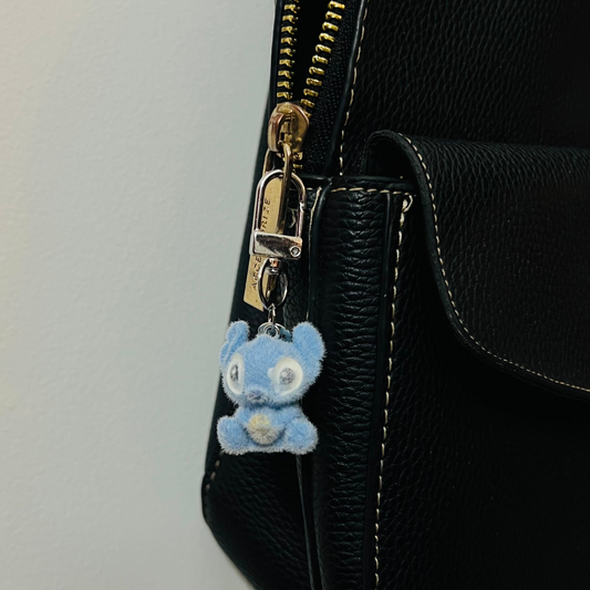 Furry pastel-blue Snitch bag charm