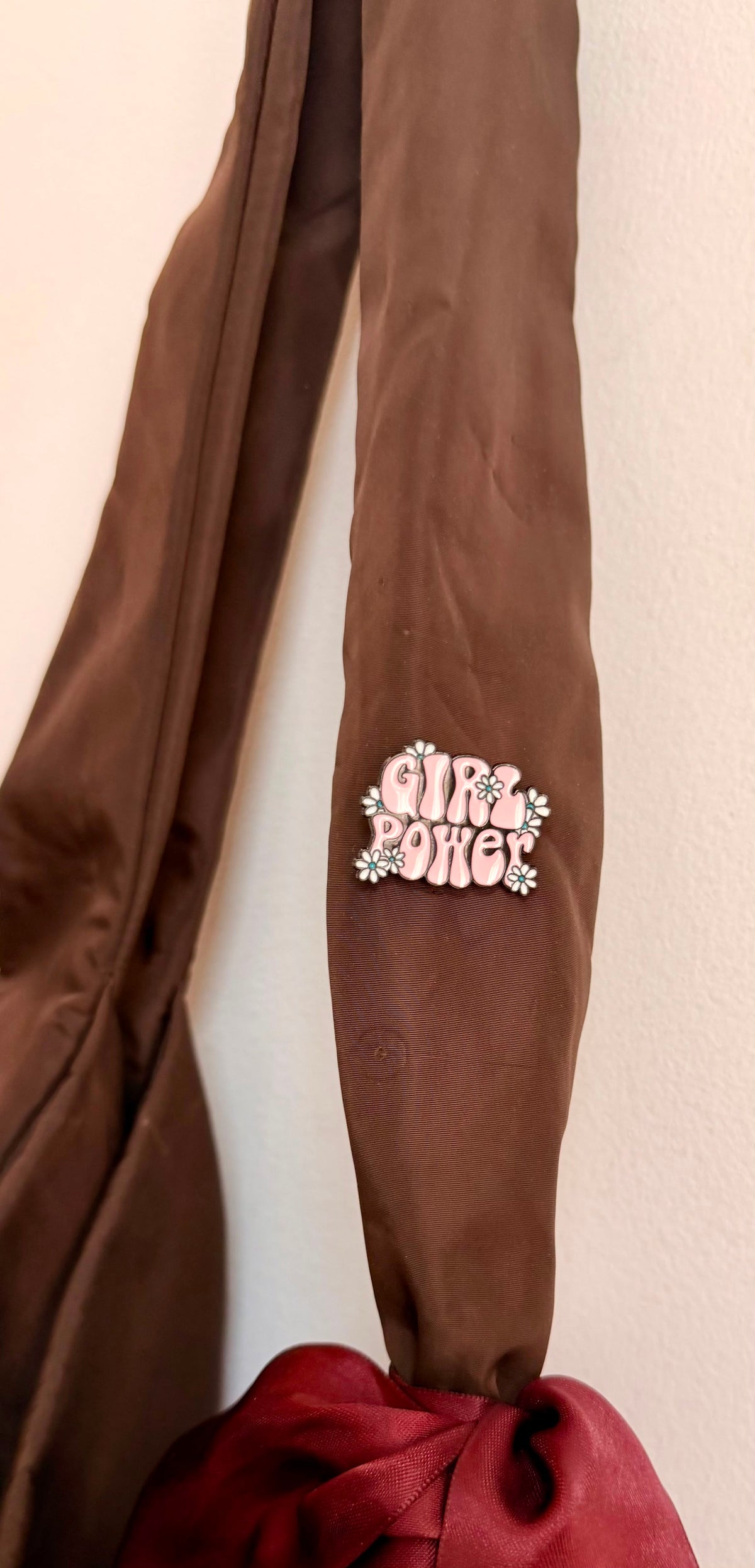 Her Era Enamel Pin, Girl Power in pink retro bubble letters with white daisies