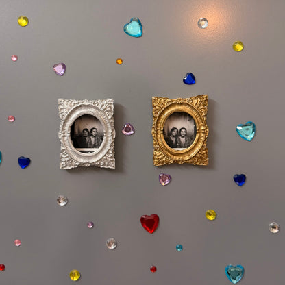 Hold This Moment Magnetic Frame, silver and gold concrete frames side by side on a fridge door