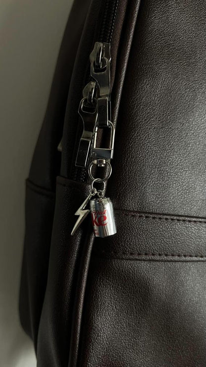 Metallic Diet Coke can and lightning bolt charm on a lobster clasp, dark brown leather bag