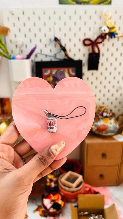 Cherry Diet Coke mini can phone charm with black strap in a pink heart gift pouch
