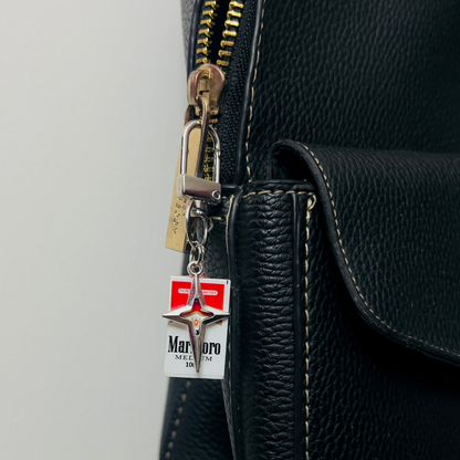 Marlboro cigarette pack bag charm with a silver star charm
