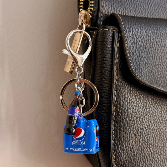 Pepsi Break, a blue cola crate with a glass bottle.
