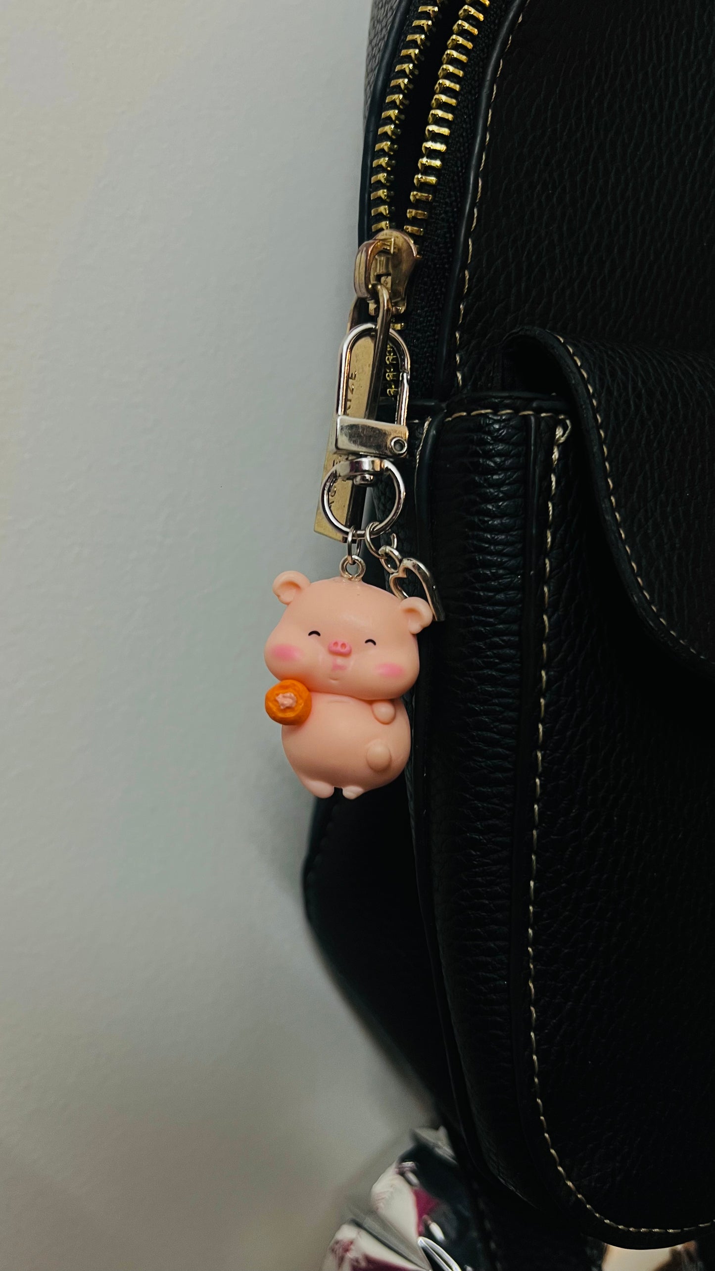 Pink Piggu piglet bag charm hugging a piece of fried chicken (view 3)