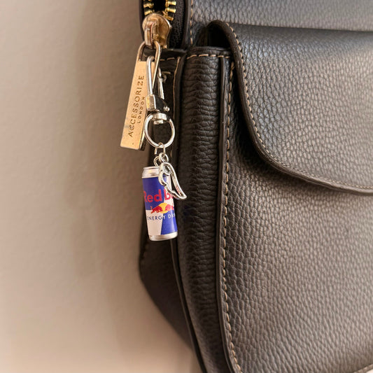 Red Bull Wings D-Hook Bag Charm, blue and silver Red Bull can with silver wings charm on a D-hook clasp