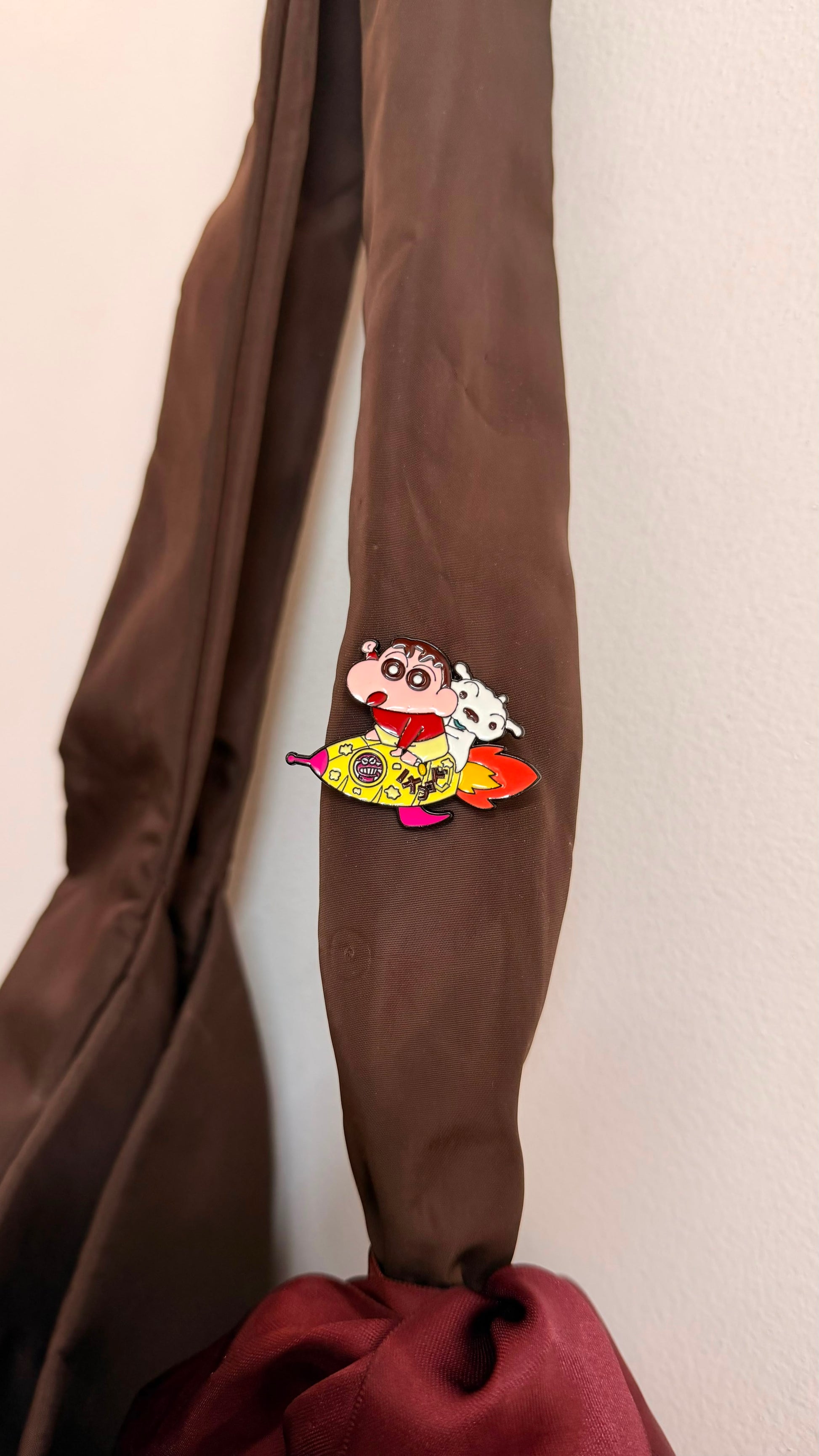 Shinchan in Space Enamel Pin, Shinchan riding a rocket with his dog Shiro