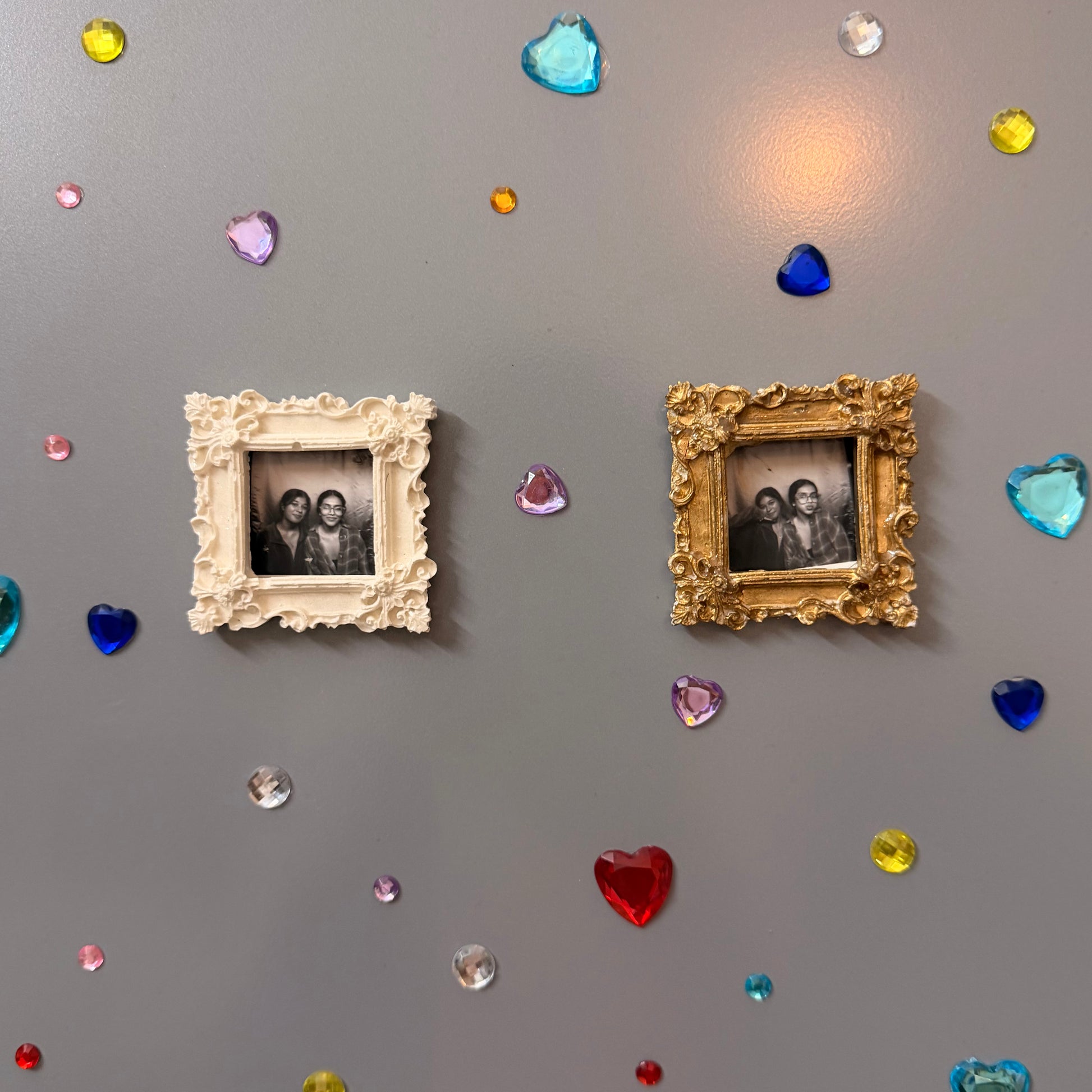The Nostalgic Magnetic Frame, white and gold concrete square frames on a fridge door