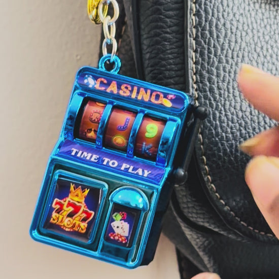 Jackpot, the casino slot machine charm shown in motion.