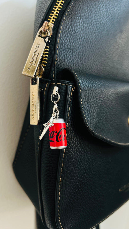 Red Coca-Cola can charm with a silver star on a black phone strap